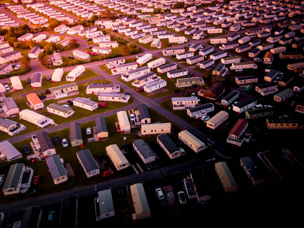 istock Sun set at a Caravan and camping park, static home aerial view. 1042870226