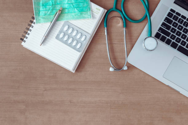 istock Doctor occupation concept, Doctor's table desk and workspace layout 1042872752
