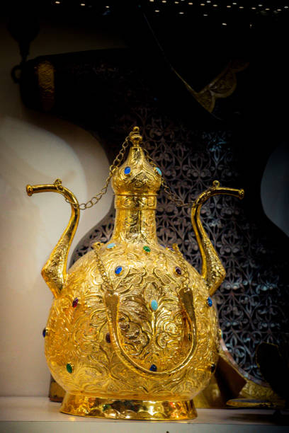istock Ancient metal jug in oriental style 1042876280