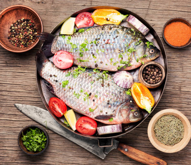 istock Fresh raw fish and food ingredients 1042882184