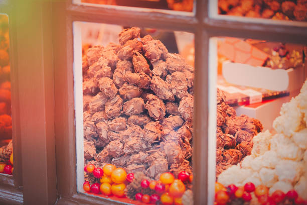 Chocolate candy near a window of workshop in Bruges, Belgium