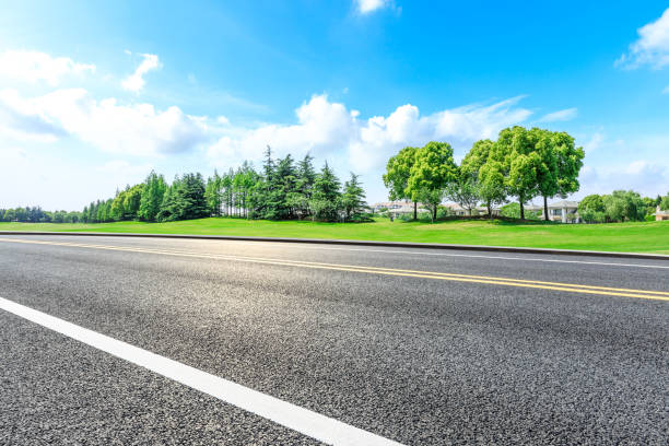 istock Asphalt highway and green forest natural scenery 1042883324