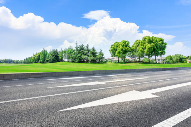 istock Asphalt highway and green forest natural scenery 1042887574