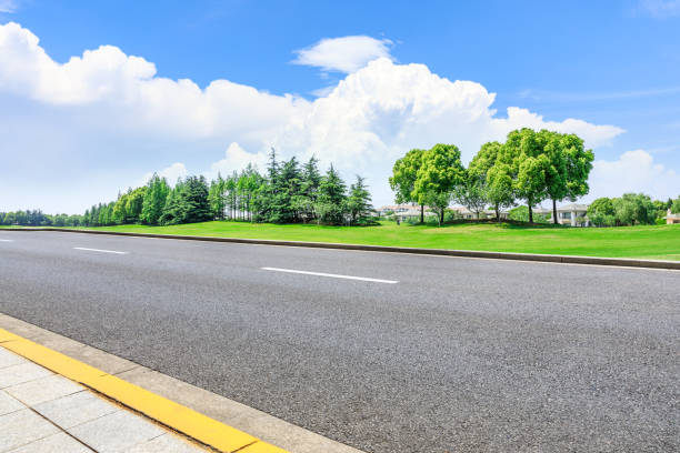 istock Asphalt highway and green forest natural scenery 1042887850