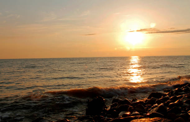 istock Sunset over the Black sea and summertime beach 1042890626