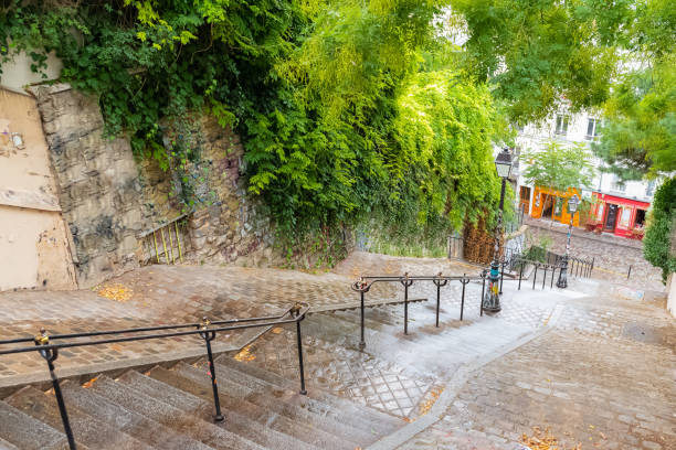 Typical alley in Montmartre, romantic staircases in Paris