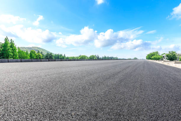 istock Asphalt highway and green forest natural scenery 1042891846