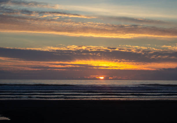 istock Sunset at a Coastal Ocean Beach 1042894622