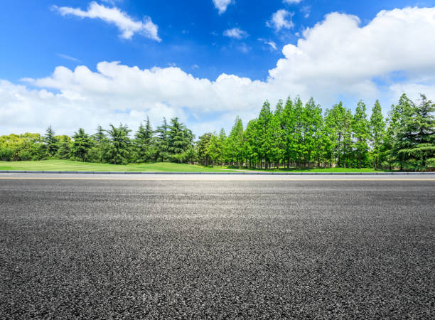 istock Asphalt highway and green forest natural scenery 1042897058