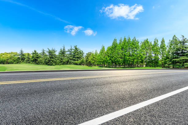 istock Asphalt highway and green forest natural scenery 1042897130