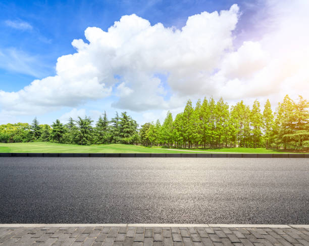 istock Asphalt highway and green forest natural scenery 1042897444