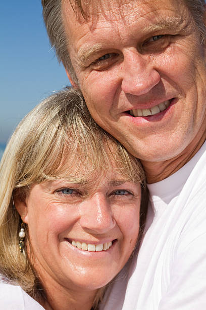 istock mature couple hugging 104289842
