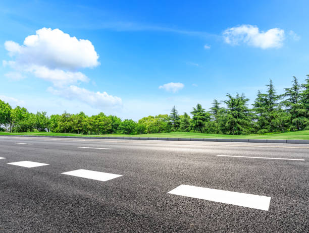 istock Asphalt highway and green forest natural scenery 1042900876