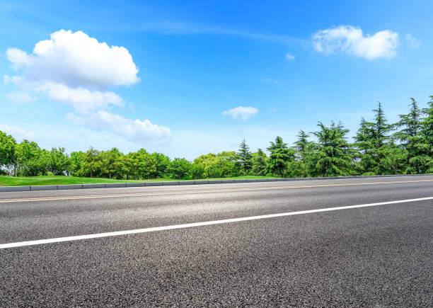 istock Asphalt highway and green forest natural scenery 1042901552