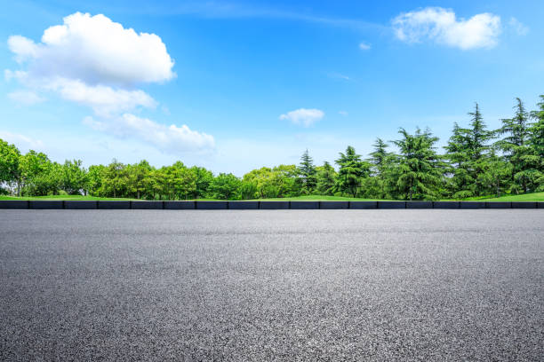 istock Asphalt highway and green forest natural scenery 1042901556