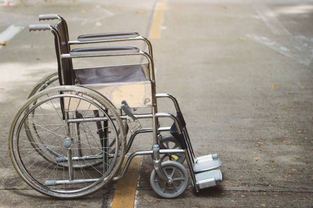istock Empty wheelchair parked in hospital 1042904130
