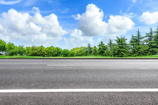 istock Asphalt highway and green forest natural scenery 1042904366
