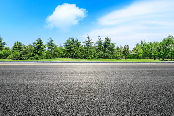 istock Asphalt highway and green forest natural scenery 1042904554