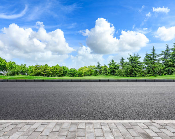 istock Asphalt highway and green forest natural scenery 1042904558