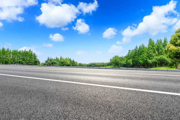 istock Asphalt highway and green forest natural scenery 1042906972