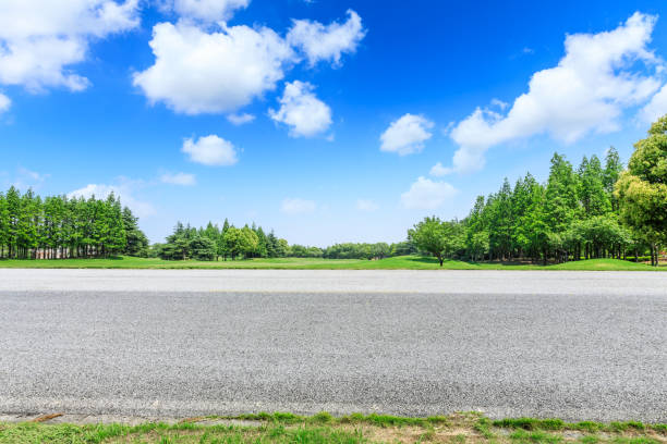 istock Asphalt highway and green forest natural scenery 1042906982