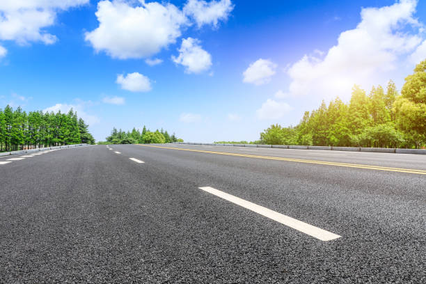 istock Asphalt highway and green forest natural scenery 1042907240