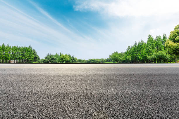 istock Asphalt highway and green forest natural scenery 1042907630