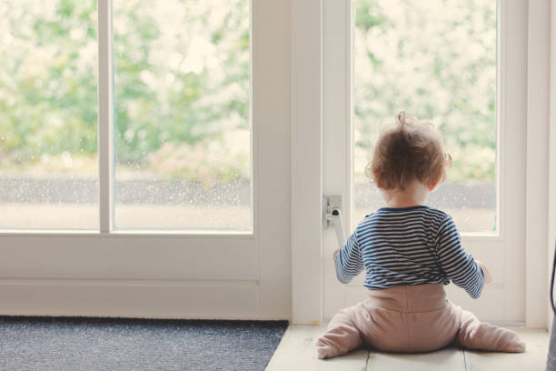 istock Little baby boy have a fun on a floor 1042913808