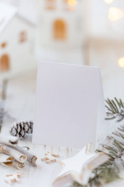 istock White Christmas greeting card with festive decoration 1042918150