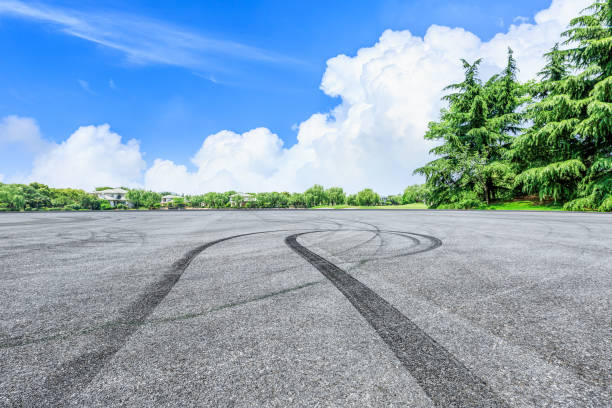 istock Asphalt race track and green forest natural landscape 1042918372