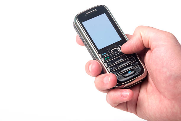 istock Cell phone in hand, included clipping path of the screen 104292022