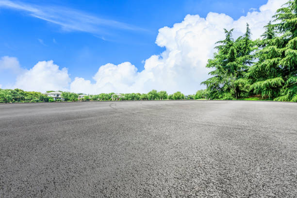 istock Asphalt road and green forest natural scenery 1042920658