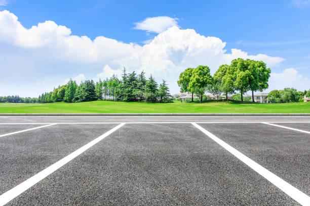 istock Asphalt road and green forest natural scenery 1042920718