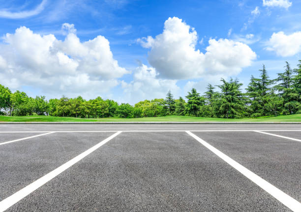 istock Asphalt road and green forest natural scenery 1042920806
