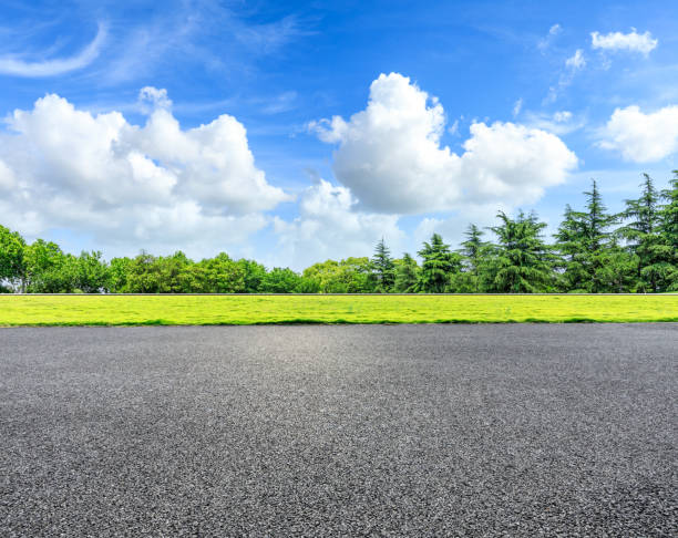 istock Asphalt road and green forest natural scenery 1042921006
