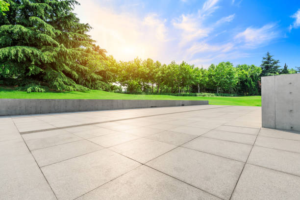 istock Empty square floor and green forest natural scenery 1042921358