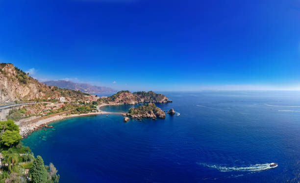 Isola bella in Taormina, Sicily Aerial view on Isola bella in Taormina giardini naxos stock pictures, royalty-free photos & images