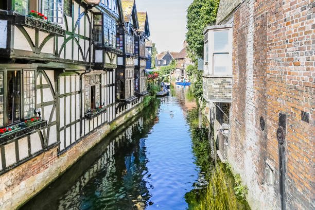 Ancient center of Caterbury Historic center of Canterbury with half timbered houses and the river Great Stour, Kent, UK canterbury england photos stock pictures, royalty-free photos & images