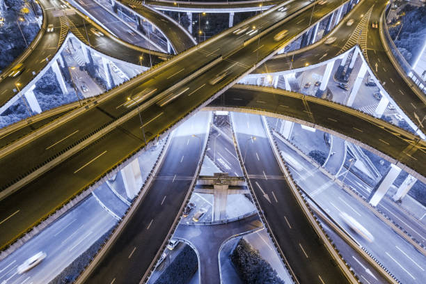 istock aerial view of highway interchange at night 1042927040