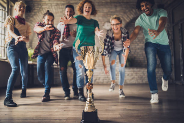 istock Who will get first to the trophy? 1042927522