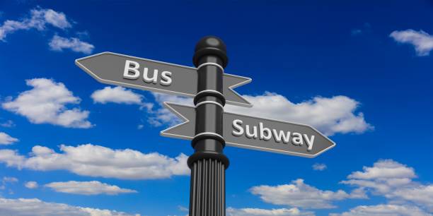 istock Bus and subway on signpole 1042927852
