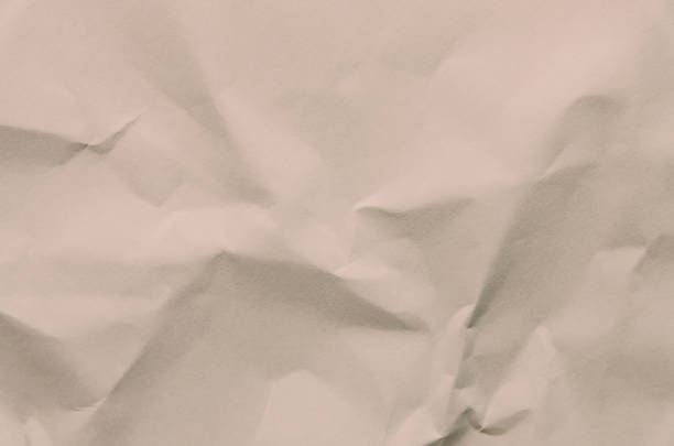 istock Old and vintage background by crumpled paper texture and free space for text. 1042928182