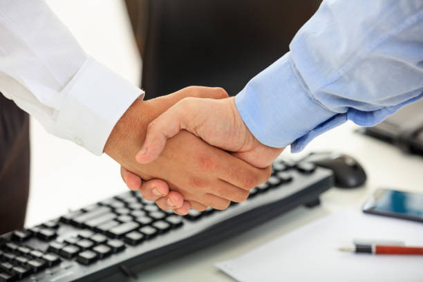 istock Close up of business handshake 1042933432