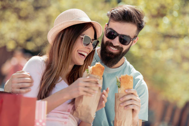 istock Young couple enjoying on picnic 1042936730