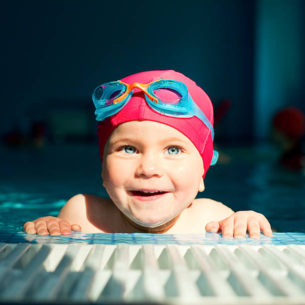 istock Child in a swimming pool 104293975