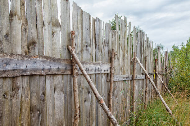 istock rough old wooden fence 1042942168