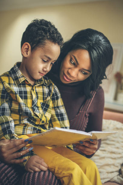 istock Story tale time. African family. 1042942326