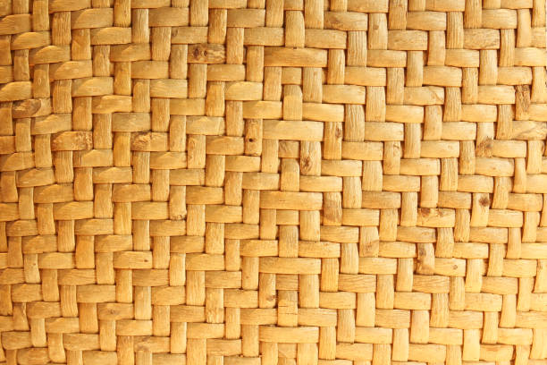 istock Wicker woven beige mat handmade background. 1042943028