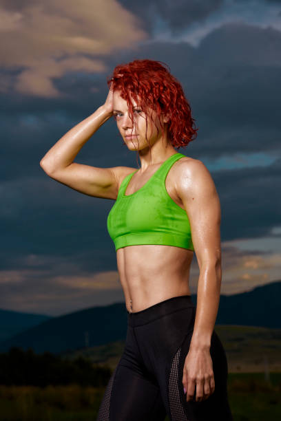 istock fit woman after sport training 1042943248