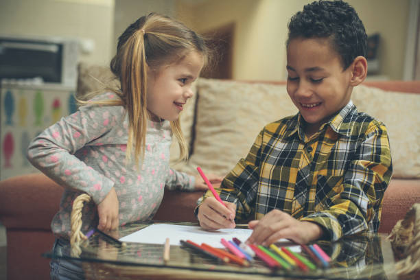 istock Little smart girl and boy. 1042947760